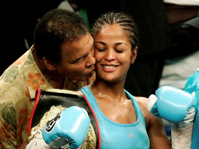 WBC and WIBA super middleweight champion Laila Ali is kissed by her father, boxing great Muhammad Ali. (REUTERS photo) WBC and WIBA super middleweight champion Laila Ali is kissed by her father, boxing great Muhammad Ali. (REUTERS photo)