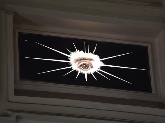 An All Seeing Eye painted on glass adorns one wall — a reminder, like the G, that there are no secrets from the Divine Being (Kunal Patil/htphoto) 