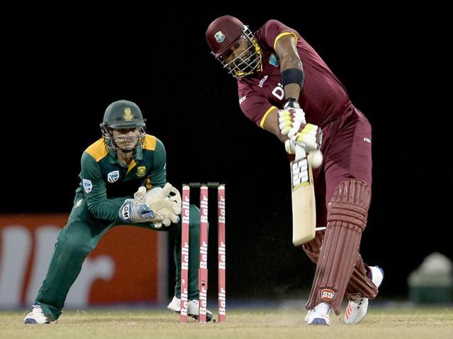 West Indie's Kieron Pollard plays a shot during the One-day International (ODI) cricket match. (AFP Photo) West Indie's Kieron Pollard plays a shot during the One-day International (ODI) cricket match. (AFP Photo)