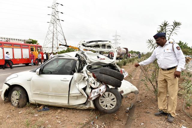 The DZire car was completely crashed from the rear.  (Bachchan Kumar/HT Photo)
