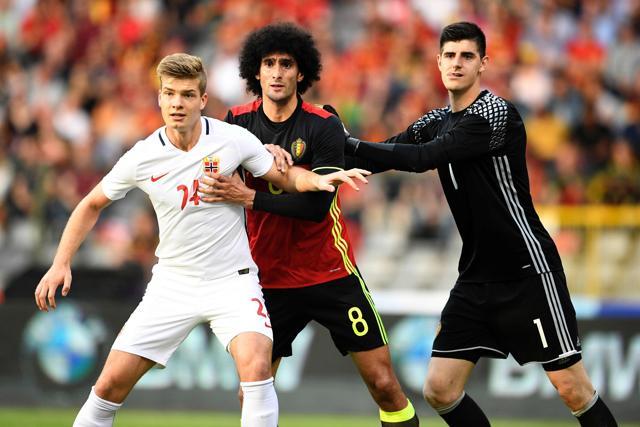 (From left to right) Norway's Alexander Sorloth, Belgium's Marouane Fellaini and Belgium goalkeeper Thibaut Courtois look on during the friendly football match between Belgium and Norway, at the King Baudouin Stadium in Brussels. (AFP Photo) (From left to right) Norway's Alexander Sorloth, Belgium's Marouane Fellaini and Belgium goalkeeper Thibaut Courtois look on during the friendly football match between Belgium and Norway, at the King Baudouin Stadium in Brussels. (AFP Photo)
