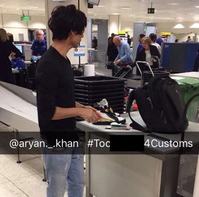 Here’s Aryan Khan getting his luggage checked at the airport.