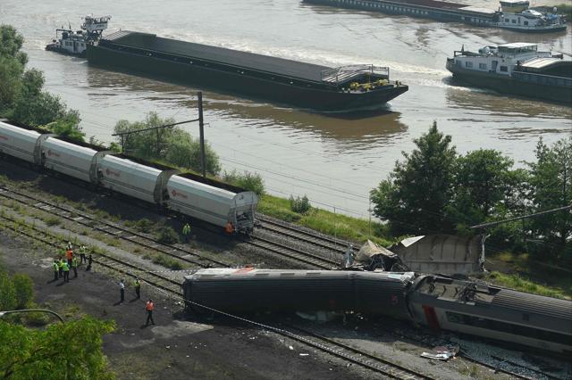 A picture taken on June 6, 2016 shows damaged trains following a collision between a goods train and a passenger train killing at least three people near Saint-Georges-sur-Meuse. (AFP) A picture taken on June 6, 2016 shows damaged trains following a collision between a goods train and a passenger train killing at least three people near Saint-Georges-sur-Meuse. (AFP)