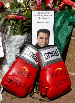 Fans of the late Muhammad Ali, the former world heavyweight boxing champion leave personal mementos as they pay their respects at the Ali Center in Louisville, Kentucky, US. (Reuters Photo) Fans of the late Muhammad Ali, the former world heavyweight boxing champion leave personal mementos as they pay their respects at the Ali Center in Louisville, Kentucky, US. (Reuters Photo)