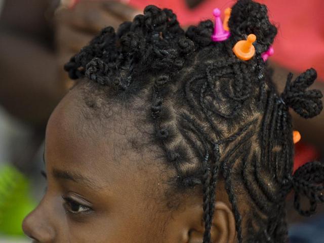The contest has three categories: women’s braids, men’s braids and children’s braids.  (AFP) 