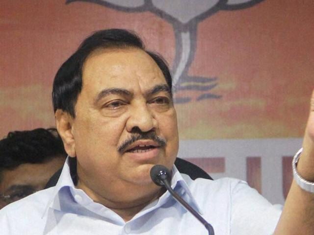 Eknath Khadse addressing to media after resigning following allegations of impropriety in land deal, at BJP office, in Mumbai. (PTI Photo) Eknath Khadse addressing to media after resigning following allegations of impropriety in land deal, at BJP office, in Mumbai. (PTI Photo)
