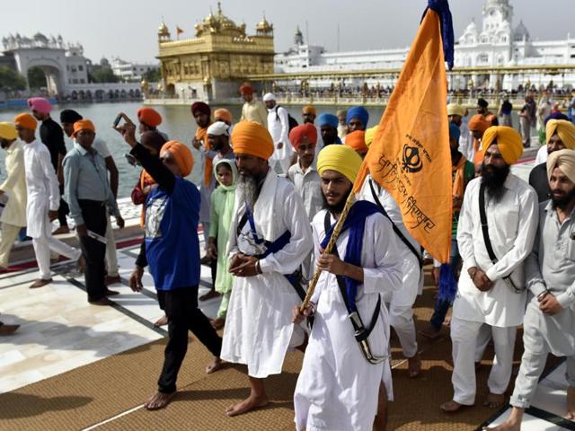Activists of the Sikh radical group at the Golden Temple in Amritsar on Monday. (Gurpreet Singh/HT)