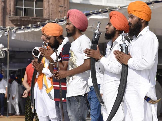 Activists of Sikh radical group attending the 32nd anniversary of Operation Bluestar at Akal Takht Sahib at the Golden Temple in Amritsar on Monday. (Gurpreet Singh/HT)