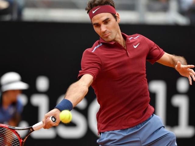 Switzerland's Roger Federer returns the ball to Germany's Alexander Zverev. (AFP Photo) Switzerland's Roger Federer returns the ball to Germany's Alexander Zverev. (AFP Photo)