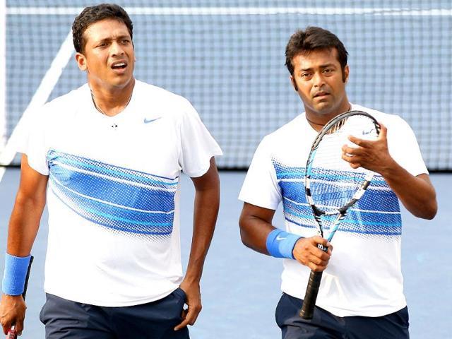 India's doubles team of Mahesh Bhupathi and Leander Paes talk in between games of their match against Marc Lopez and Rafael Nadal of Spain during the Western &amp; Southern Open in Mason, Ohio. (File Photo)