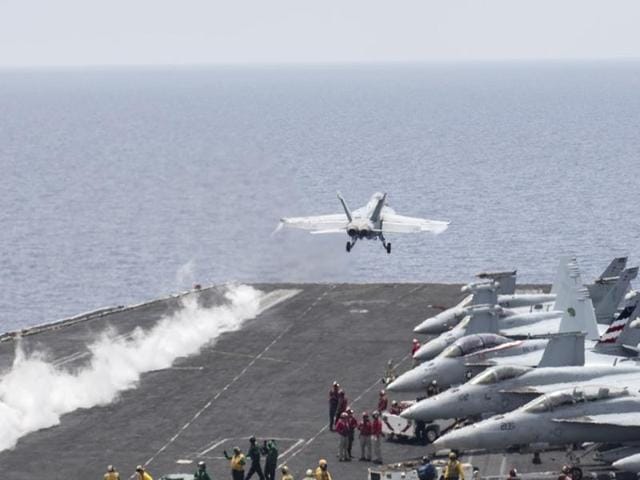 A US Navy F/A-18E Super Hornet fighter jet launches from the flight deck of the aircraft carrier USS Harry S. Truman in the Mediterranean Sea in a photo released by the US Navy on June 3, 2016.(REUTERS)