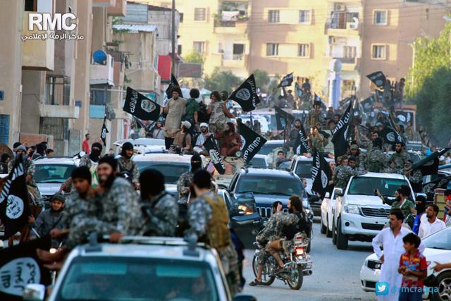 In this undated file image, fighters from the Islamic State parade in Raqqa, north Syria. (AP) In this undated file image, fighters from the Islamic State parade in Raqqa, north Syria. (AP)