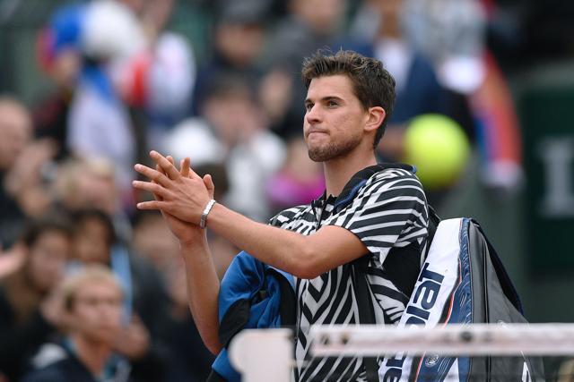 Austria's Dominic Thiem gestures as he walks off the court after losing his men's semifinal match against Serbia's Novak Djokovic at the Roland Garros 2016 French Tennis Open in Paris. (AFP Photo) Austria's Dominic Thiem gestures as he walks off the court after losing his men's semifinal match against Serbia's Novak Djokovic at the Roland Garros 2016 French Tennis Open in Paris. (AFP Photo)