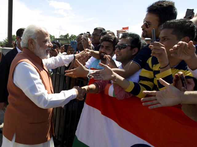 Prime Minister Narendra Modi shake hands with member of the Indian community in Washington upon his arrival at Andrews Air Force Base. (AP) Prime Minister Narendra Modi shake hands with member of the Indian community in Washington upon his arrival at Andrews Air Force Base. (AP)