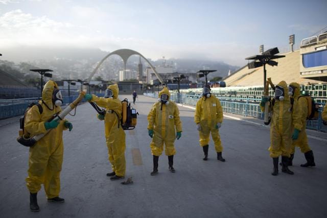 Health workers get ready to spray insecticide to combat the Aedes aegypti mosquitoes that transmits the Zika virus, under the bleachers of the Sambadrome in Rio de Janeiro, which will be used for the Archery competition in the 2016 summer games.(AP file photo)