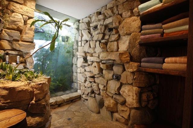A shower in the pool area of the Playboy Mansion is seen in Los Angeles. AP