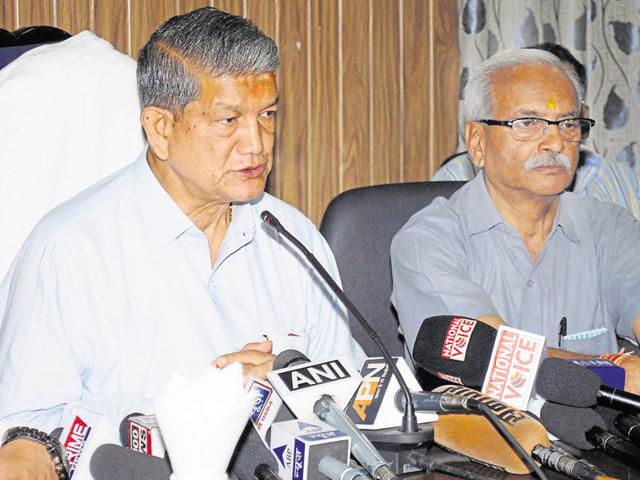 Chief minister Harish Rawat addresses a press conference in Dehradun on Wednesday, a day after he was questioned by the CBI in Delhi. (HT Photo) Chief minister Harish Rawat addresses a press conference in Dehradun on Wednesday, a day after he was questioned by the CBI in Delhi. (HT Photo)