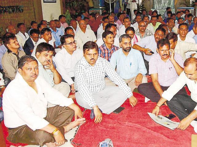 The striking employees said their demand is arrest of the accused persons who were involved in the attack on officials. (HT Photo)