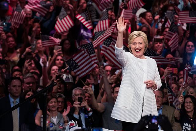Democratic presidential candidate Hillary Clinton arrives onstage during a primary night rally at the Duggal Greenhouse in the Brooklyn Navy Yard, June 7, 2016 in the Brooklyn borough of New York City. (AFP Photo) Democratic presidential candidate Hillary Clinton arrives onstage during a primary night rally at the Duggal Greenhouse in the Brooklyn Navy Yard, June 7, 2016 in the Brooklyn borough of New York City. (AFP Photo)