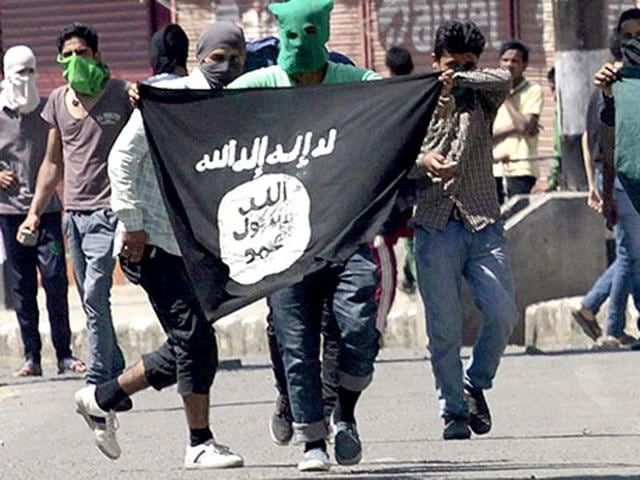 File photo of protesters displaying the IS and Pakistani flags in Srinagar, Jammu-Kashmir. The BJP has expressed concern over hoisting of Pakistani and ISIS flags in the Valley. (Waseem Andrabi / HT Photo) File photo of protesters displaying the IS and Pakistani flags in Srinagar, Jammu-Kashmir. The BJP has expressed concern over hoisting of Pakistani and ISIS flags in the Valley. (Waseem Andrabi / HT Photo)