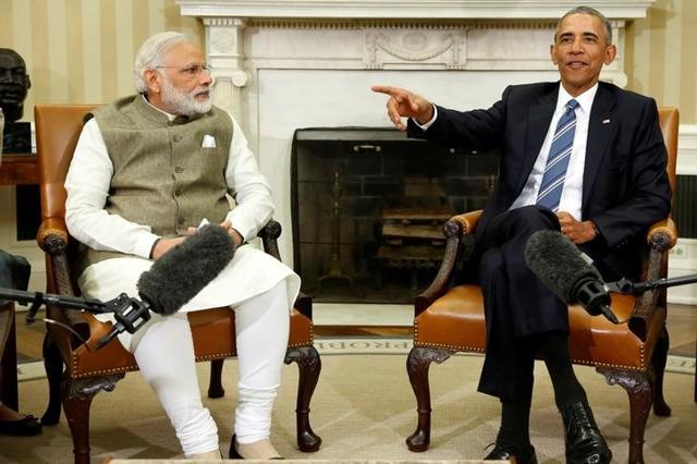 US President Barack Obama (R) encourages reporters to spread out and fill the room as he and India's Prime Minister Narendra Modi finish their meeting in the Oval Office at the White House in Washington, (Reuters) US President Barack Obama (R) encourages reporters to spread out and fill the room as he and India's Prime Minister Narendra Modi finish their meeting in the Oval Office at the White House in Washington, (Reuters)