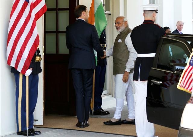 US Chief of Protocol Ambassador Peter Selfridge (centre L) greets Prime Minister Narendra Modi (centre R) as he arrives to meet with US President Barack Obama in the Oval Office at the White House in Washington. (REUTERS) US Chief of Protocol Ambassador Peter Selfridge (centre L) greets Prime Minister Narendra Modi (centre R) as he arrives to meet with US President Barack Obama in the Oval Office at the White House in Washington. (REUTERS)