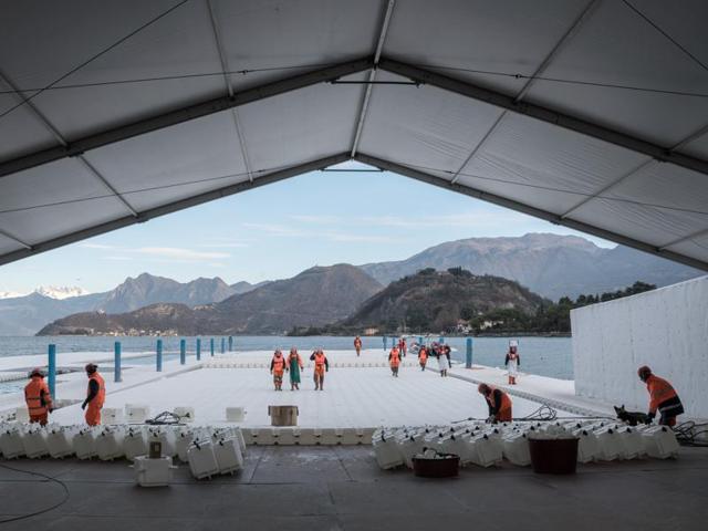 At the headquarters in Montecolino, construction workers collect the piers, which are assembled in 100-meter-long segments and stored outside Montecolino on Lake Iseo. (Wolfgang Volz)