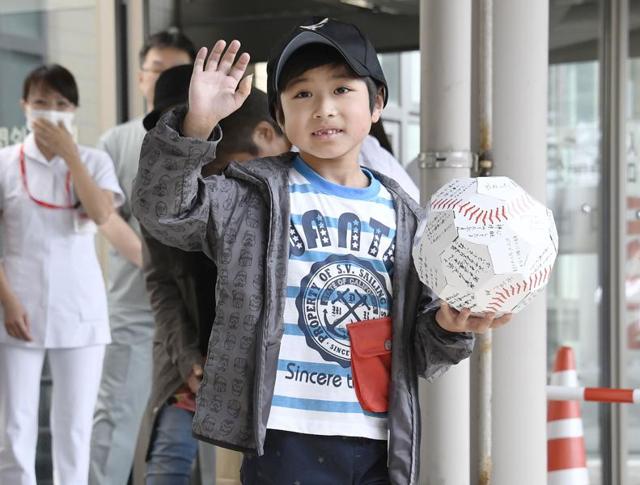 Yamato Tanooka, who was found after being abandoned by his parents as punishment in a forest, waves as he leaves a hospital in Hakodate on the northern island of Hokkaido.o News via AP) JAPAN OUT, MANDATORY CREDIT (AP) Yamato Tanooka, who was found after being abandoned by his parents as punishment in a forest, waves as he leaves a hospital in Hakodate on the northern island of Hokkaido.o News via AP) JAPAN OUT, MANDATORY CREDIT (AP)