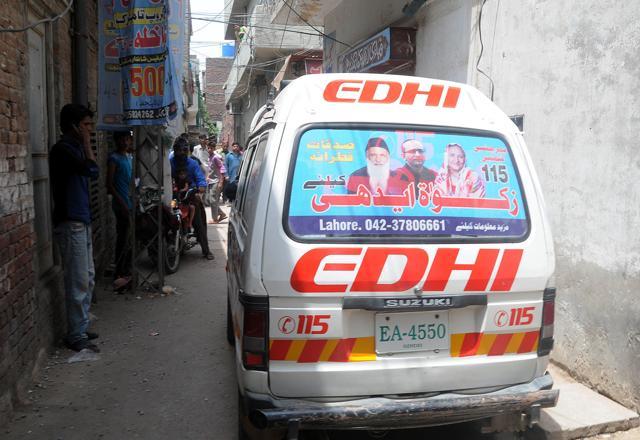 Pakistani residents watch as an ambulance transports the body of Zeenat Bibi, who was burnt alive by her mother. (AFP) Pakistani residents watch as an ambulance transports the body of Zeenat Bibi, who was burnt alive by her mother. (AFP)