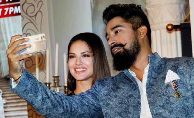 Rannvijay takes a selfie with Sunny Leone during the launch of MTV Splitsvilla Season 9 in Mumbai on Tuesday. (PTI) Rannvijay takes a selfie with Sunny Leone during the launch of MTV Splitsvilla Season 9 in Mumbai on Tuesday. (PTI)