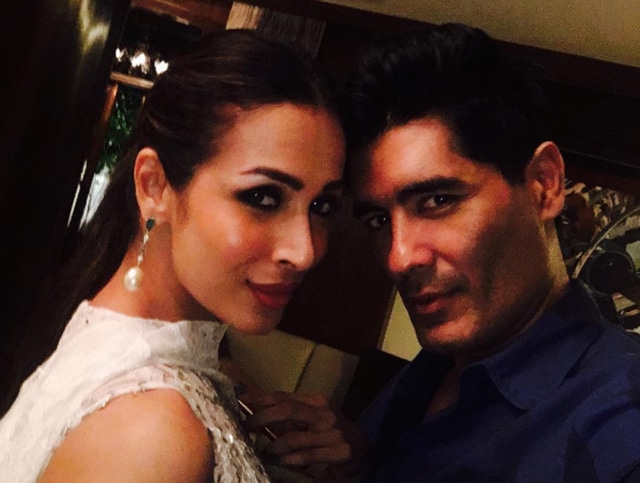 Manish Malhotra with Malaika Arora Khan. The designer took to Instagram to share pictures of his night out with the actors.