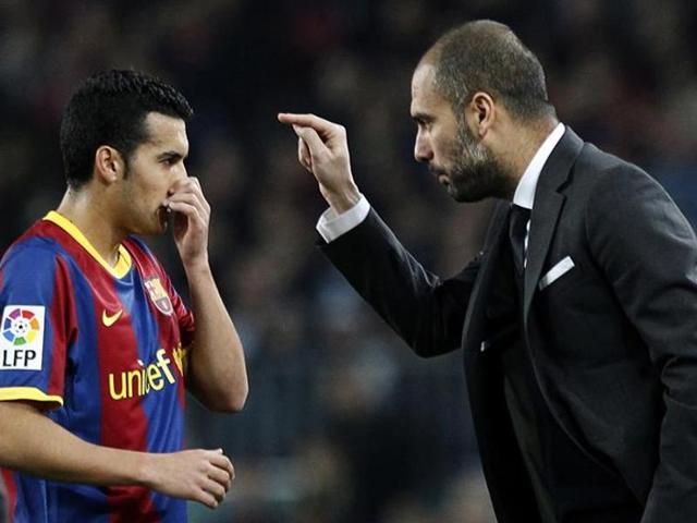 A file photo of Pep Guardiola and Pedro. (Reuters Photo) A file photo of Pep Guardiola and Pedro. (Reuters Photo)