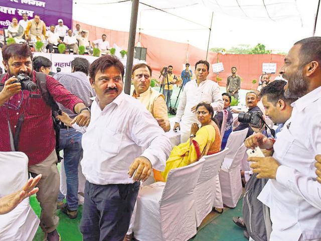 AAP councillor Rakesh Kumar (second from left) after he was assaulted by BJP members at Ramlila Maidan. (Sushil Kumar/ Hindustan Times) AAP councillor Rakesh Kumar (second from left) after he was assaulted by BJP members at Ramlila Maidan. (Sushil Kumar/ Hindustan Times)