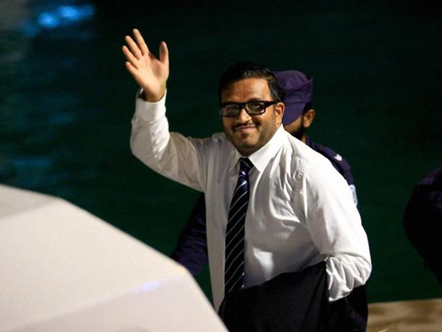 Former Maldives vice-president Ahmed Adeeb waves to the media before he boards a police speed boat in Maldives. (AP) Former Maldives vice-president Ahmed Adeeb waves to the media before he boards a police speed boat in Maldives. (AP)
