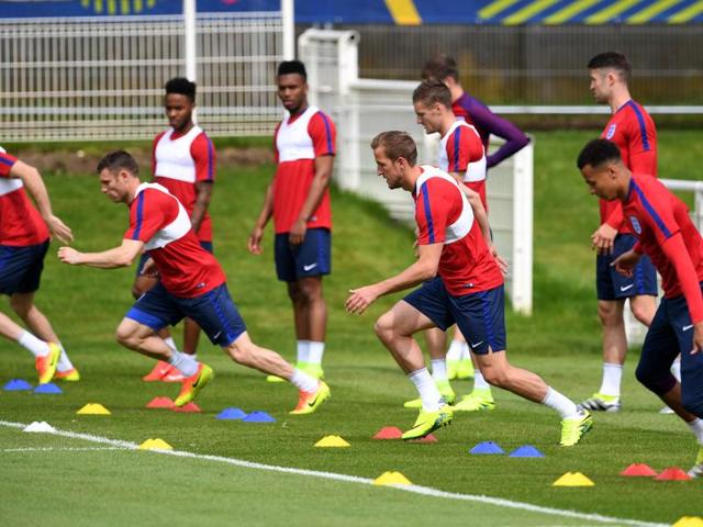 England players engage in drills. (AFP) England players engage in drills. (AFP)