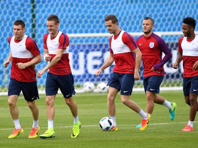 From left to right: Midfielder James Milner, forward Jamie Vardy, midfielder Jordan Henderson, midfielder Jack Wilshere, and midfielder Raheem Sterling during a running drill. (AFP) From left to right: Midfielder James Milner, forward Jamie Vardy, midfielder Jordan Henderson, midfielder Jack Wilshere, and midfielder Raheem Sterling during a running drill. (AFP)
