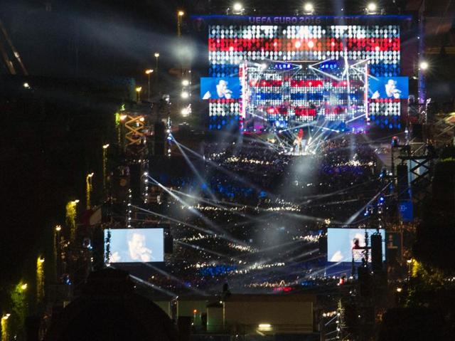 Lights illuminate the fan zone during the concert. (AFP)