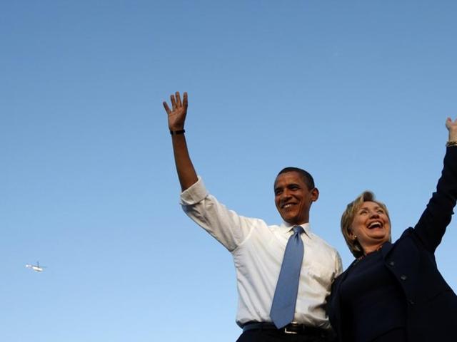 Barack Obama and Hillary Clinton wave at a campaign rally in Orlando, Florida, October 20, 2008. (REUTERS) Barack Obama and Hillary Clinton wave at a campaign rally in Orlando, Florida, October 20, 2008. (REUTERS)