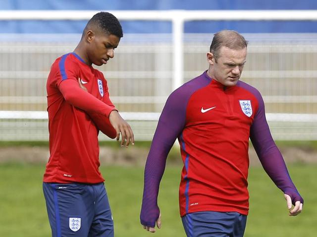 Manchester United teammates Wayne Rooney , right, and Marcus Rashford during a training session. (AP) Manchester United teammates Wayne Rooney , right, and Marcus Rashford during a training session. (AP)