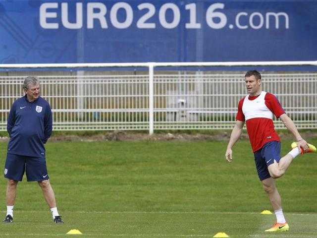 James Milner stretches under the watchful eye of England coach Roy Hodgson. (AP) James Milner stretches under the watchful eye of England coach Roy Hodgson. (AP)
