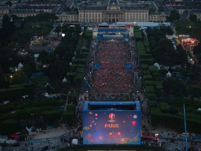 The fan zone on the Champs de Mars is thronged by people during the concert. (AFP)