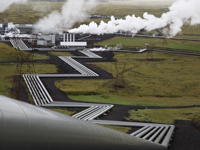 Giant ducts carry superheated steam from within a volcanic field to the turbines at Reykjavik Energy's Hellisheidi geothermal power plant. Scientists have a found a quick but not cheap way to turn heat-trapping carbon dioxide into harmless rock.(AP File Photo)