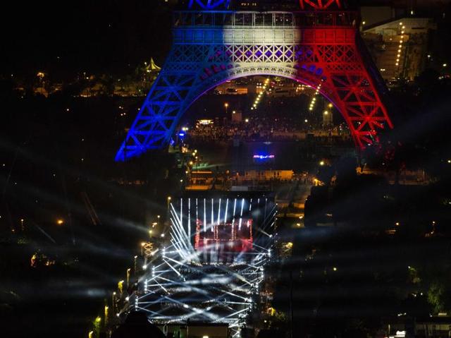 The Eiffel lit up in the colours of the French flag. (AFP)