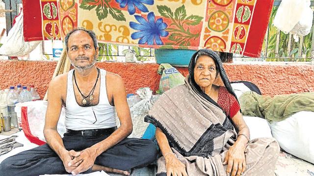 Anil Kumar Gupta, 52, has been living in Jantar Mantar for the past three years with his 90-year-old mother, Anguri Devi. He says he has ideas to tackle crime and corruption. Anil Kumar Gupta, 52, has been living in Jantar Mantar for the past three years with his 90-year-old mother, Anguri Devi. He says he has ideas to tackle crime and corruption.