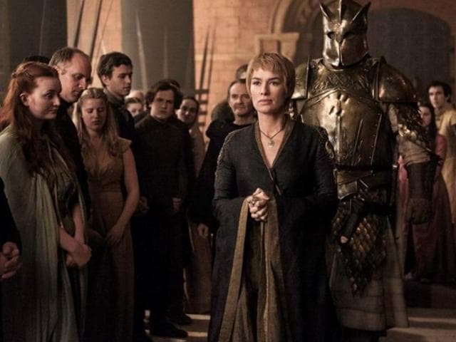 Back in King’s Landing, Cersei is parading the Mountain around for some reason. By the way, what are those dents on his armour? (HBO) 