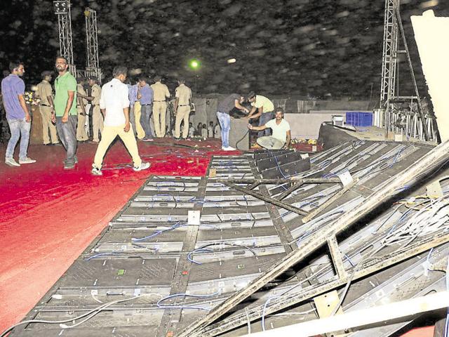 The stage of the yoga festival crashed after heavy storm disrupted the proceedings at Parade Ground in Sector 17, Chandigarh, on Friday. (Keshav Singh/HT) The stage of the yoga festival crashed after heavy storm disrupted the proceedings at Parade Ground in Sector 17, Chandigarh, on Friday. (Keshav Singh/HT)