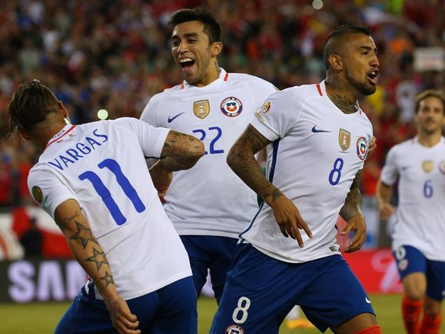 Arturo Vidal scores the controversial penalty for Chile’s winner. (AFP) Arturo Vidal scores the controversial penalty for Chile’s winner. (AFP)