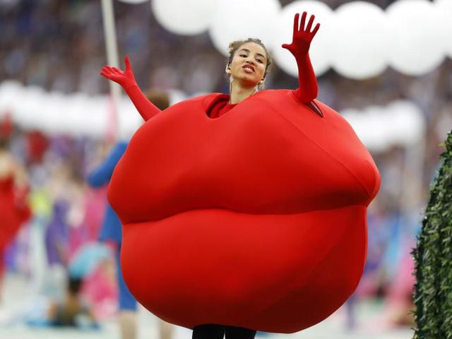 An artist performs during the opening ceremony. (AP)