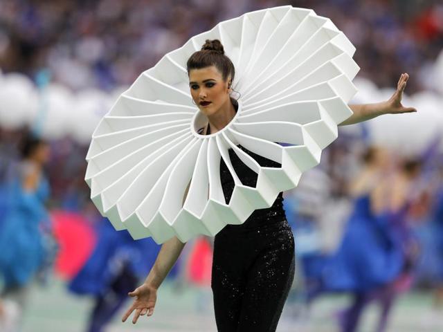 An artist performs during the opening ceremony of the Euro 2016 championship, prior to the Group A soccer match between France and Romania. (AP)