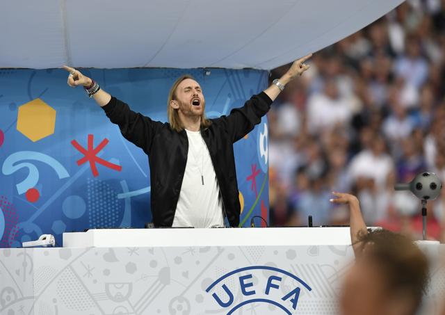 French DJ David Guetta performs during the opening ceremony of the Euro 2016 Soccer Championship ahead of the Group A soccer match between France and Romania, at the Stade de France. (AP Photo) French DJ David Guetta performs during the opening ceremony of the Euro 2016 Soccer Championship ahead of the Group A soccer match between France and Romania, at the Stade de France. (AP Photo)